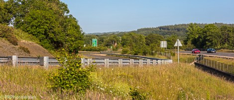 Two cars side by side on the A40 as one overtakes the other